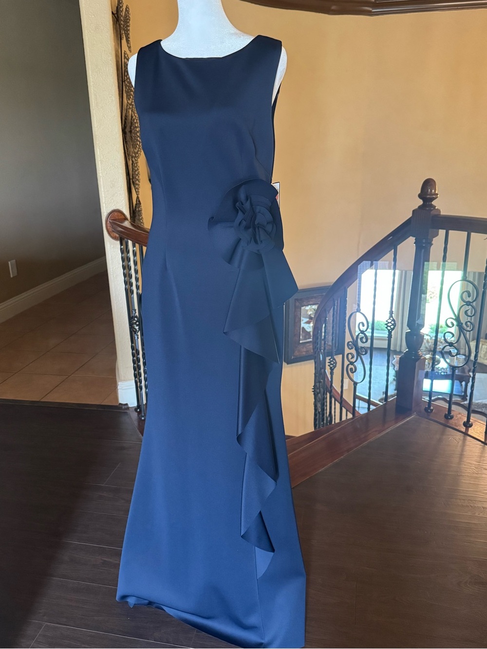 Elegant Navy Blue Sleeveless Evening Gown with Floral Accent